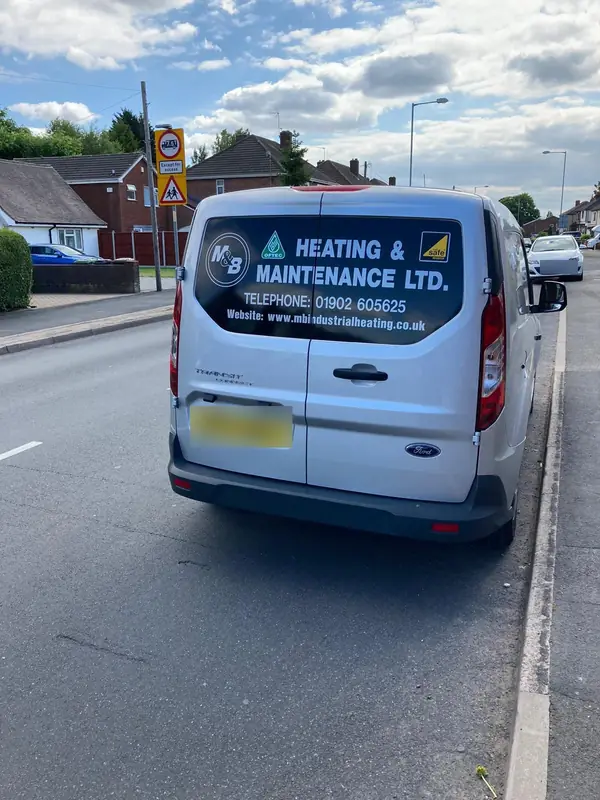 The M&B Heating & Maintenance van with company signage