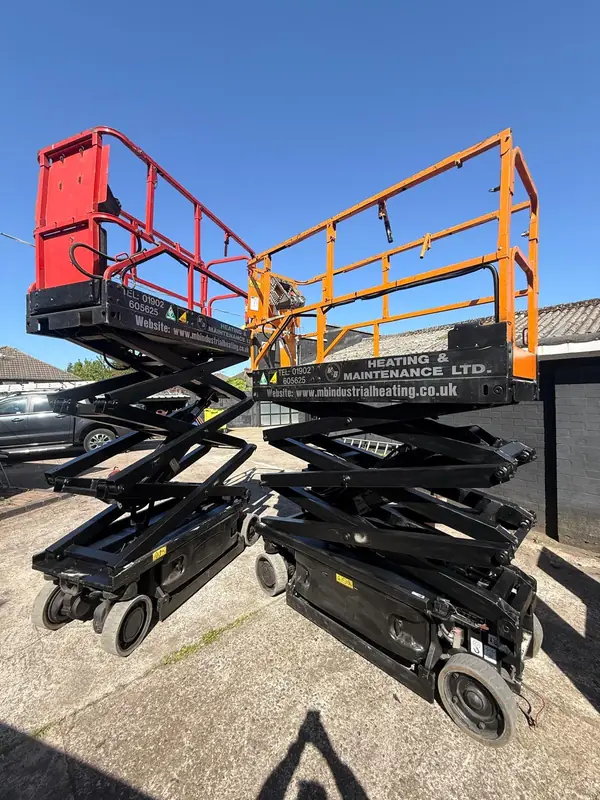M&B Heating & Maintenance scissor lifts at the yard